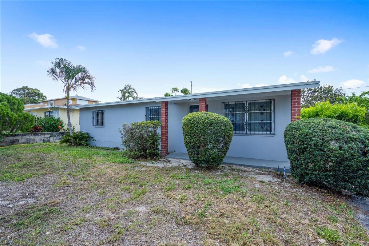 1153 West 25th Street Riviera Beach, FL 33404 - Photo 3 of 24 Front Elevation