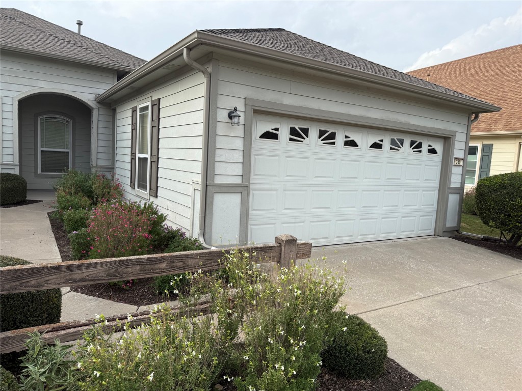 330 Portsmouth Drive Georgetown, TX 78633 - Photo 1 of 16 a front view of a house with garage