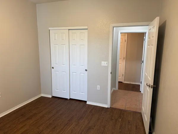 a kitchen with stainless steel appliances a refrigerator sink and microwave