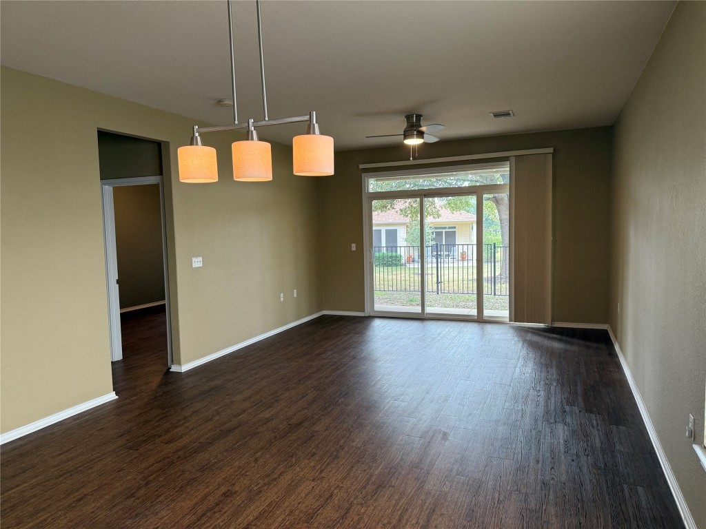 330 Portsmouth Drive Georgetown, TX 78633 - Photo 9 of 16 a view of a room with wooden floor and exposed radiator
