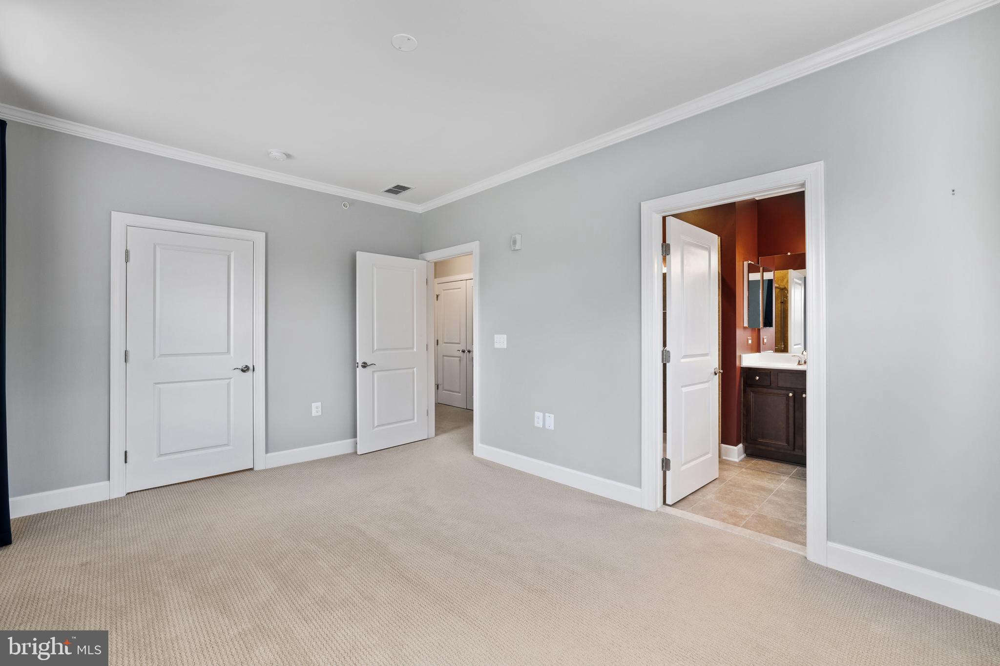 10530 Resort Road, Unit 304 Ellicott City, MD 21042 - Photo 19 of 41 Owners Bedroom