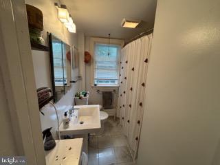 5117 Pontiac Road Drexel Hill, PA 19026 - Photo 12 of 18 Main bathroom with tub shower
