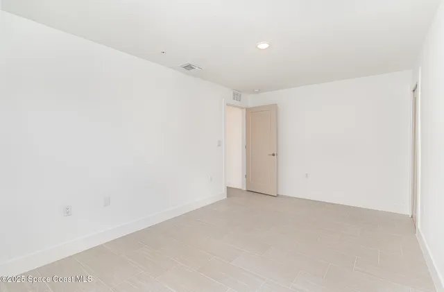 an empty room with an entryway