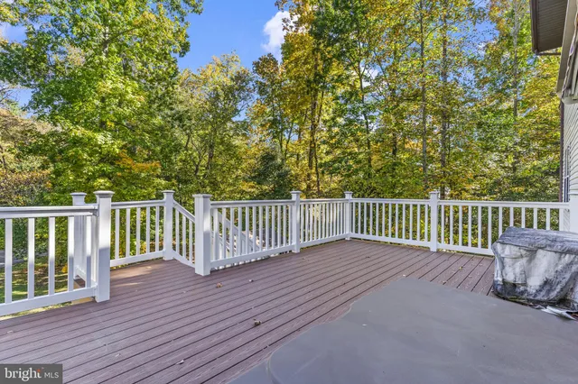 a view of a wooden roof deck