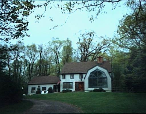 37 Trails End Road Weston, CT 06883 - Photo 1 of 1 front view of a house with a yard