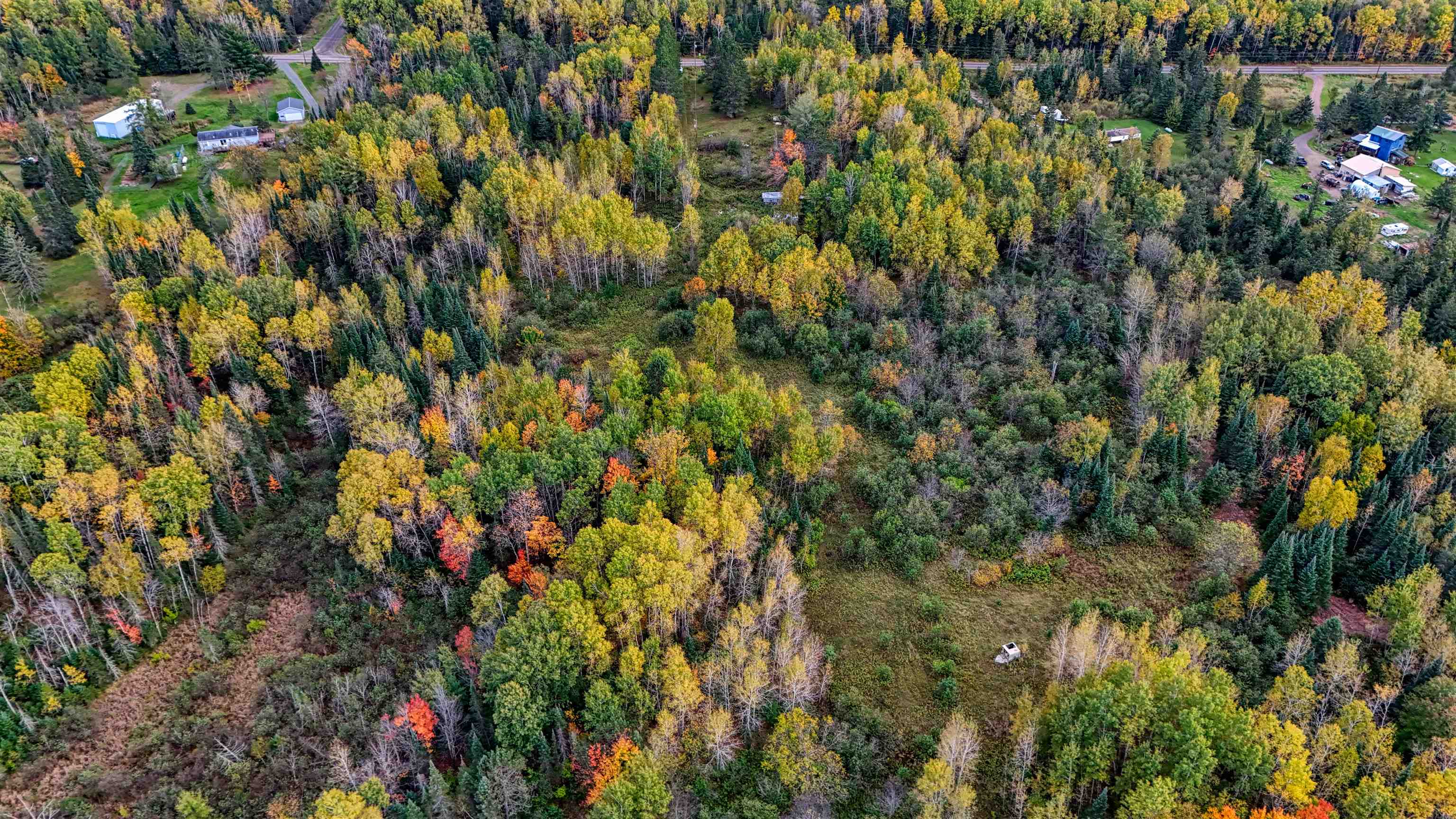 7469 East County Rd B South Range, WI 54874 - Photo 16 of 24 Aerial view of property's location with a heavily wooded area