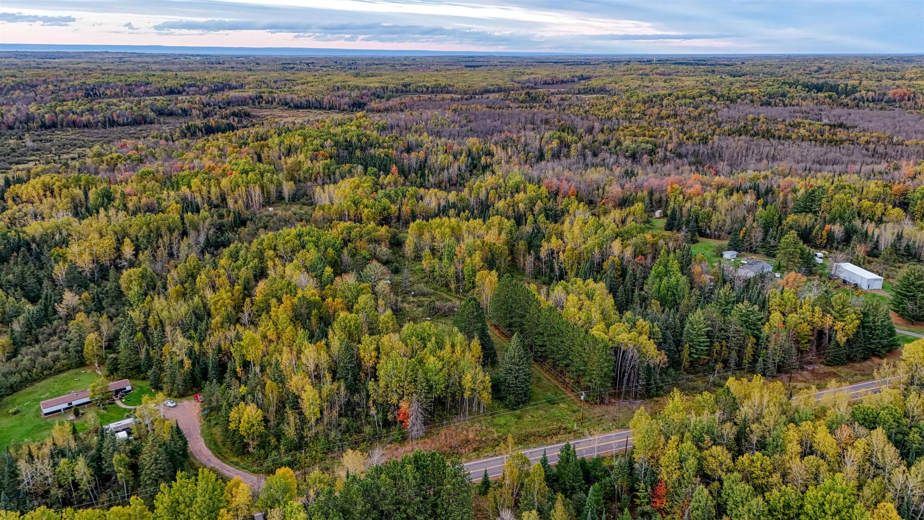 7469 East County Rd B South Range, WI 54874 - Photo 8 of 24 Aerial view of property's location featuring a forest