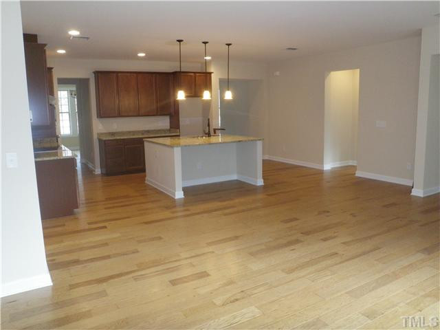 4854 Inwood Road Raleigh, NC 27603 - Photo 6 of 20 Gourmet kitchen with hardwood floors, HUGE island, granite counters, stainless appliances and MORE!