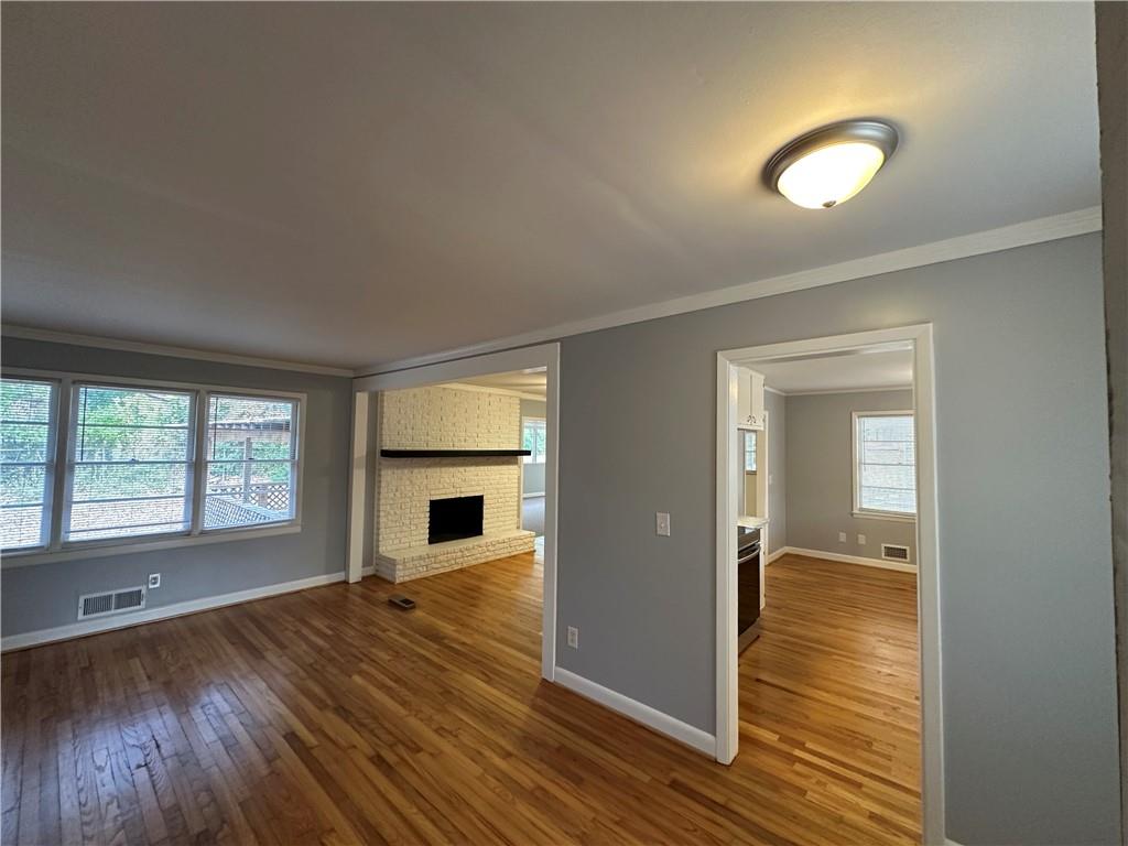 423 Center Circle Southwest Conyers, GA 30094 - Photo 6 of 24 wooden floor and windows in a room