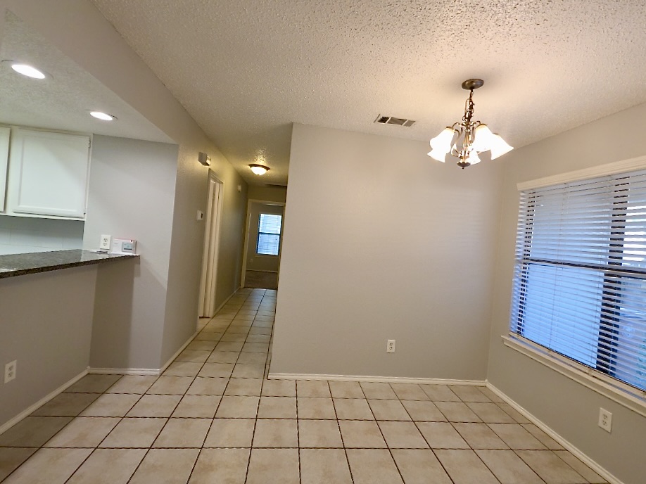 7809 Topawa Cove, Unit B Austin, TX 78729 - Photo 5 of 15 a view of an empty room