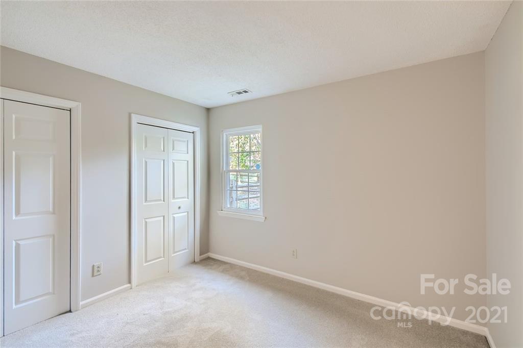 10233 Grand Junction Road Mint Hill, NC 28227 - Photo 12 of 16 an empty room with windows
