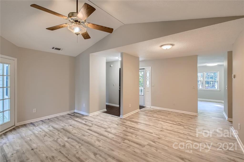10233 Grand Junction Road Mint Hill, NC 28227 - Photo 4 of 16 a view of empty room with wooden floor