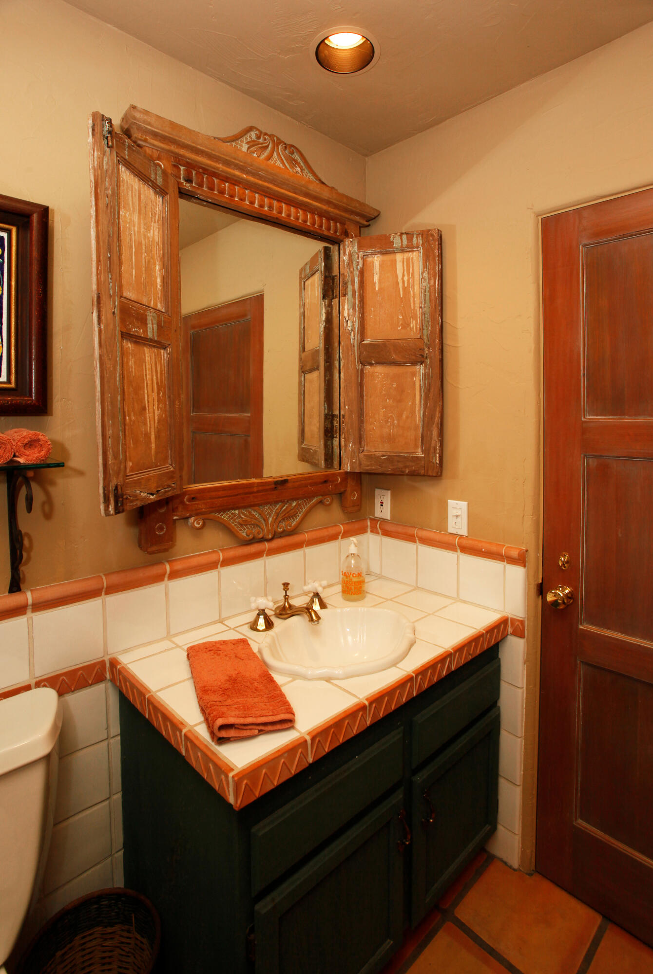 Undisclosed Address Santa Barbara, CA 93101 - Photo 13 of 17 a bathroom with a sink and a mirror