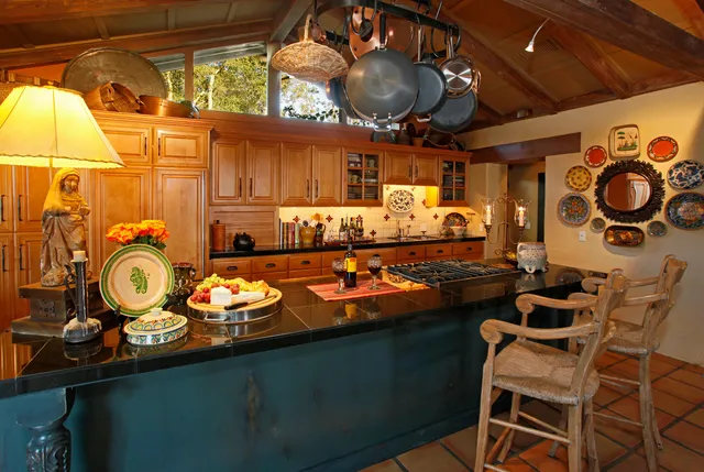 a dining room with furniture and a chandelier