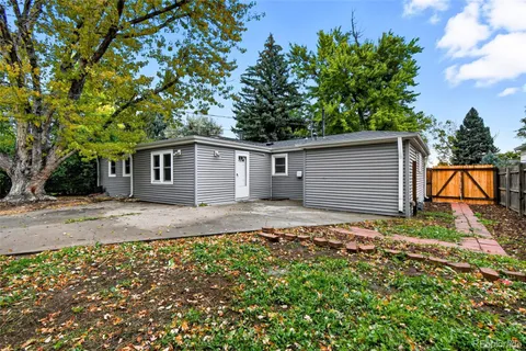 a backyard of a house with seating space