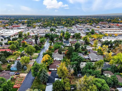 an aerial view of a city with lots of residential buildings