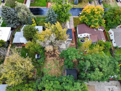 an aerial view of house with yard