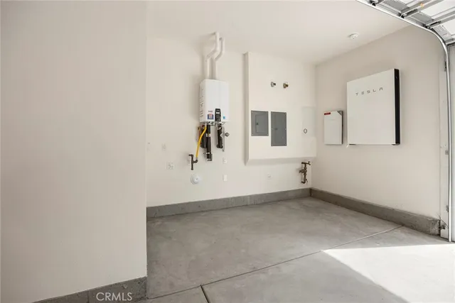 a view of a storage & utility room with window