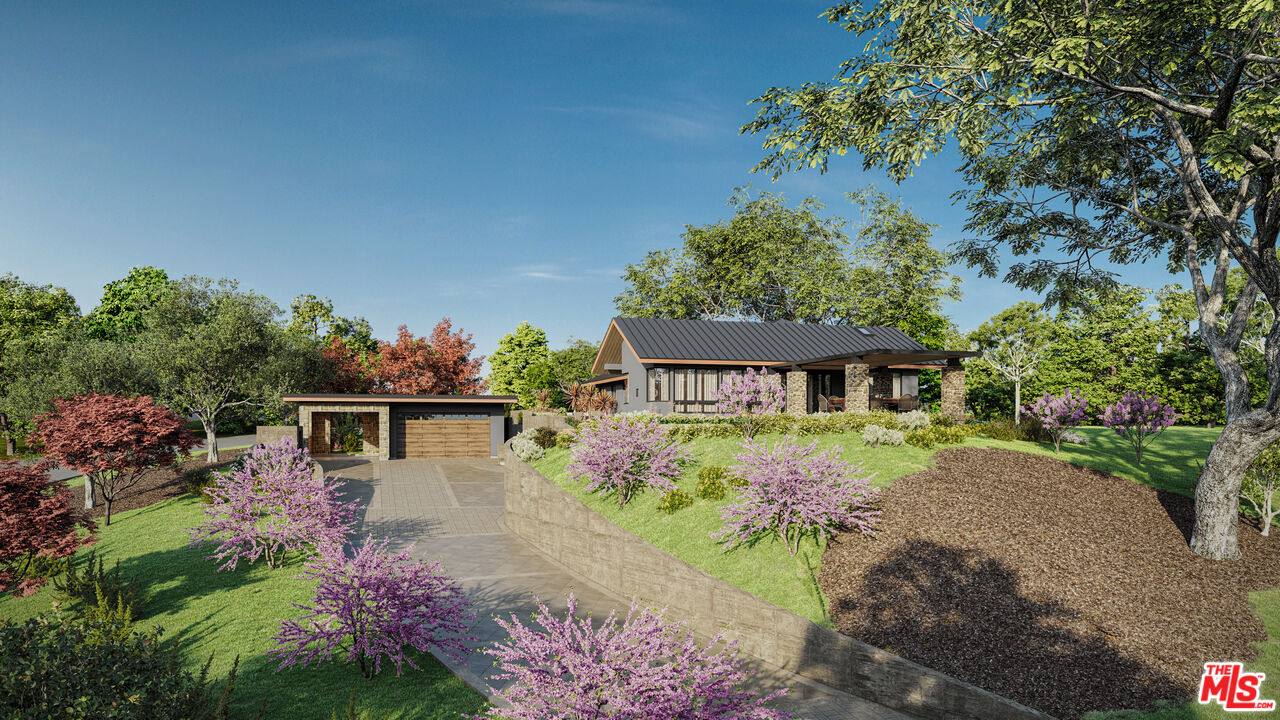 front view of a house with a yard