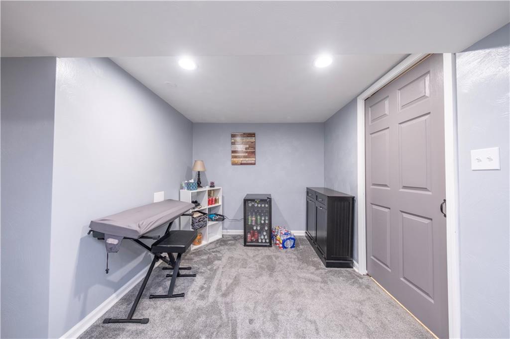 325 Clements Road Pittsburgh, PA 15239 - Photo 18 of 28 There is an additional space off of the game room and leads to the utility room