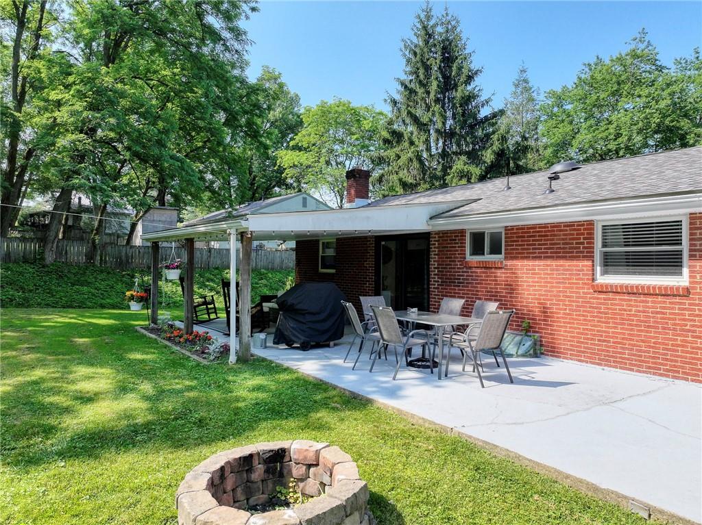 325 Clements Road Pittsburgh, PA 15239 - Photo 21 of 28 Enjoy your time out back by the fire pit or on the patio!