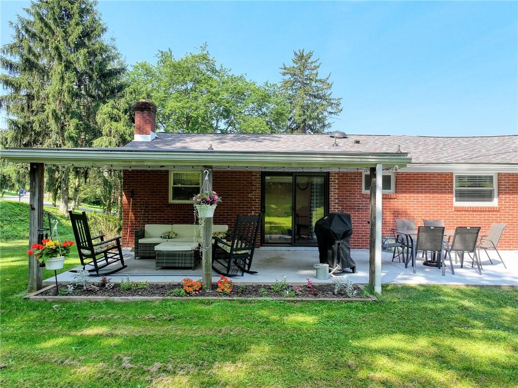 325 Clements Road Pittsburgh, PA 15239 - Photo 22 of 28 The covered patio off of the dining room
