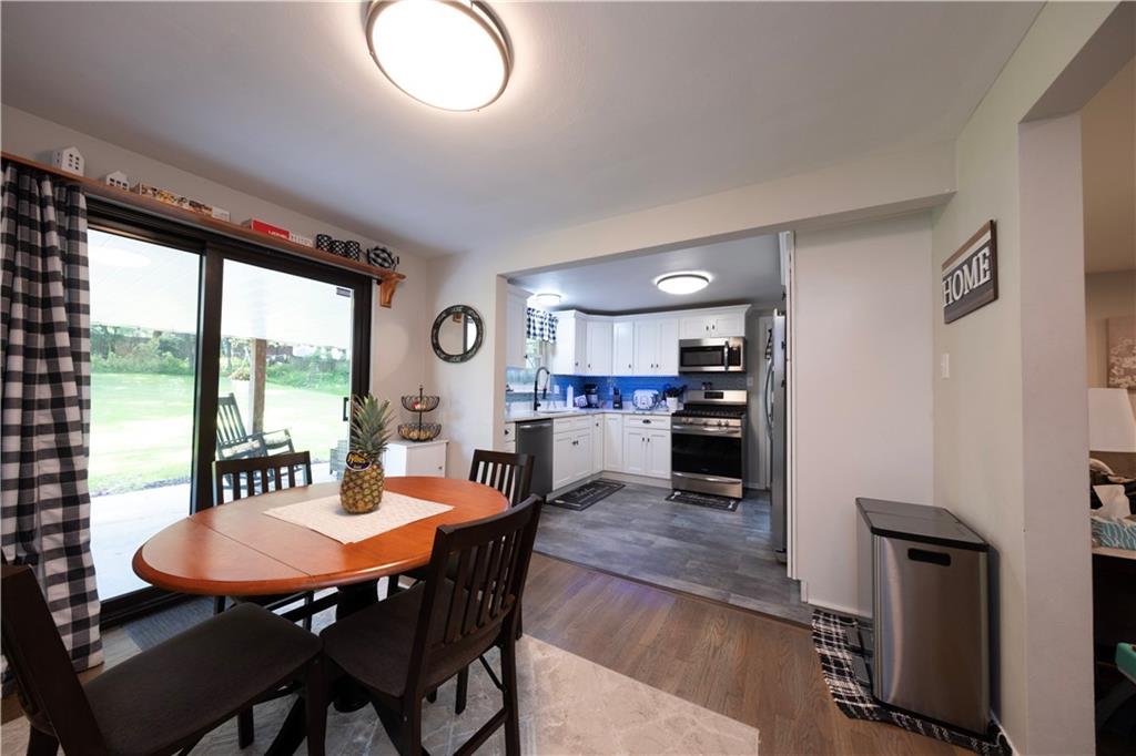 325 Clements Road Pittsburgh, PA 15239 - Photo 6 of 28 The dining area is open to the kitchen and back patio making entertaining an ease