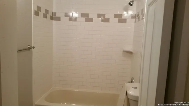 a bathroom with a bathtub