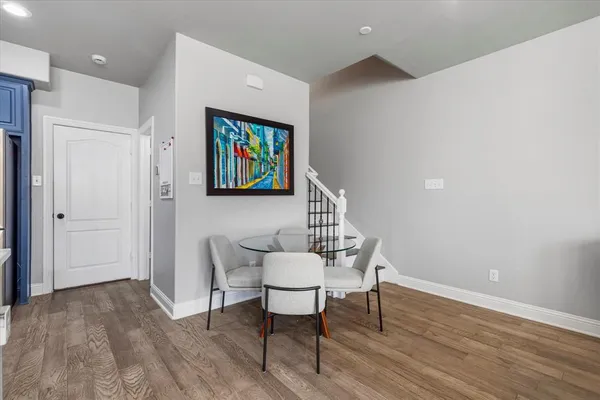 a workspace with furniture and wooden floor