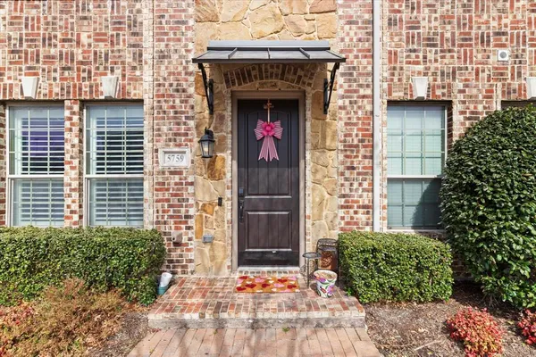 a front view of a house with shower