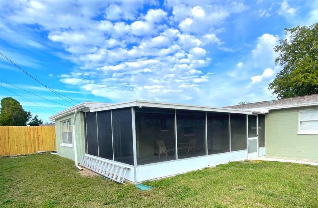 4636 Irene Loop, Unit 1 New Port Richey, FL 34652 - Photo 11 of 11 a view of a backyard with a garden