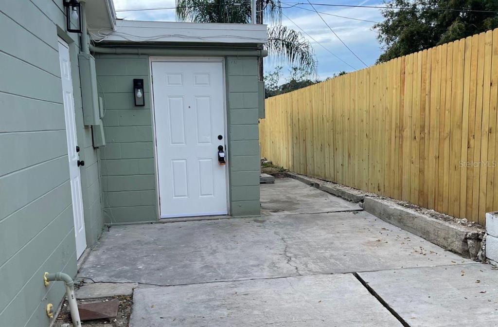 4636 Irene Loop, Unit 1 New Port Richey, FL 34652 - Photo 2 of 11 a backyard of a house