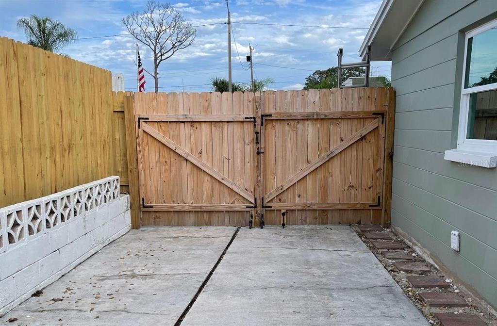 4636 Irene Loop, Unit 1 New Port Richey, FL 34652 - Photo 3 of 11 a view of a pathway