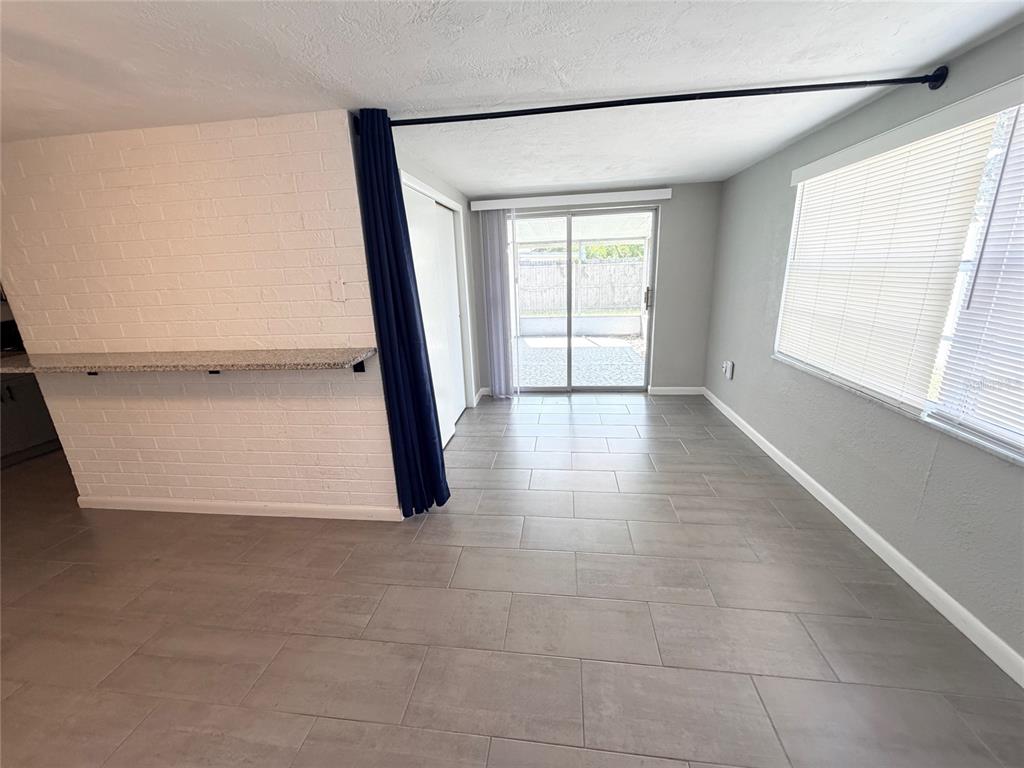 4636 Irene Loop, Unit 1 New Port Richey, FL 34652 - Photo 7 of 11 a view of an empty room with a window