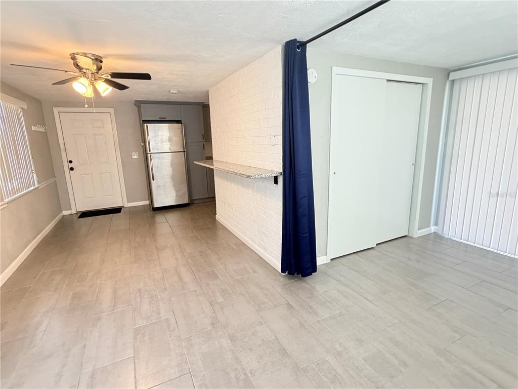 4636 Irene Loop, Unit 1 New Port Richey, FL 34652 - Photo 8 of 11 an empty room with closet and windows