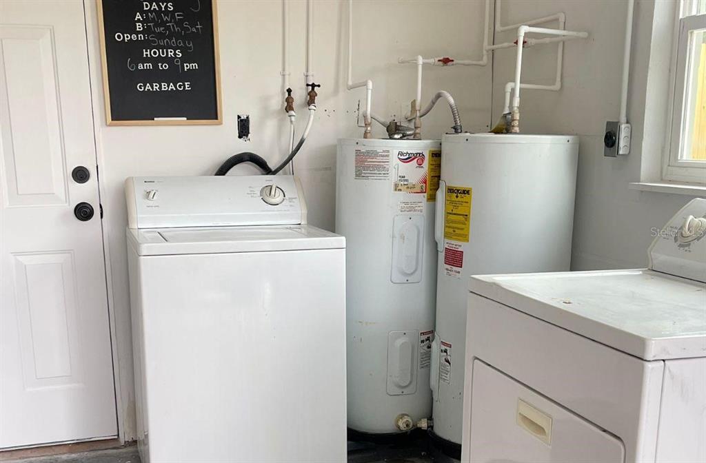 4636 Irene Loop, Unit 1 New Port Richey, FL 34652 - Photo 10 of 11 a utility room with dryer and washer