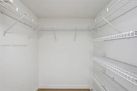 a view of a room with racks on the wall