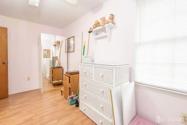 a view of a bedroom with workspace