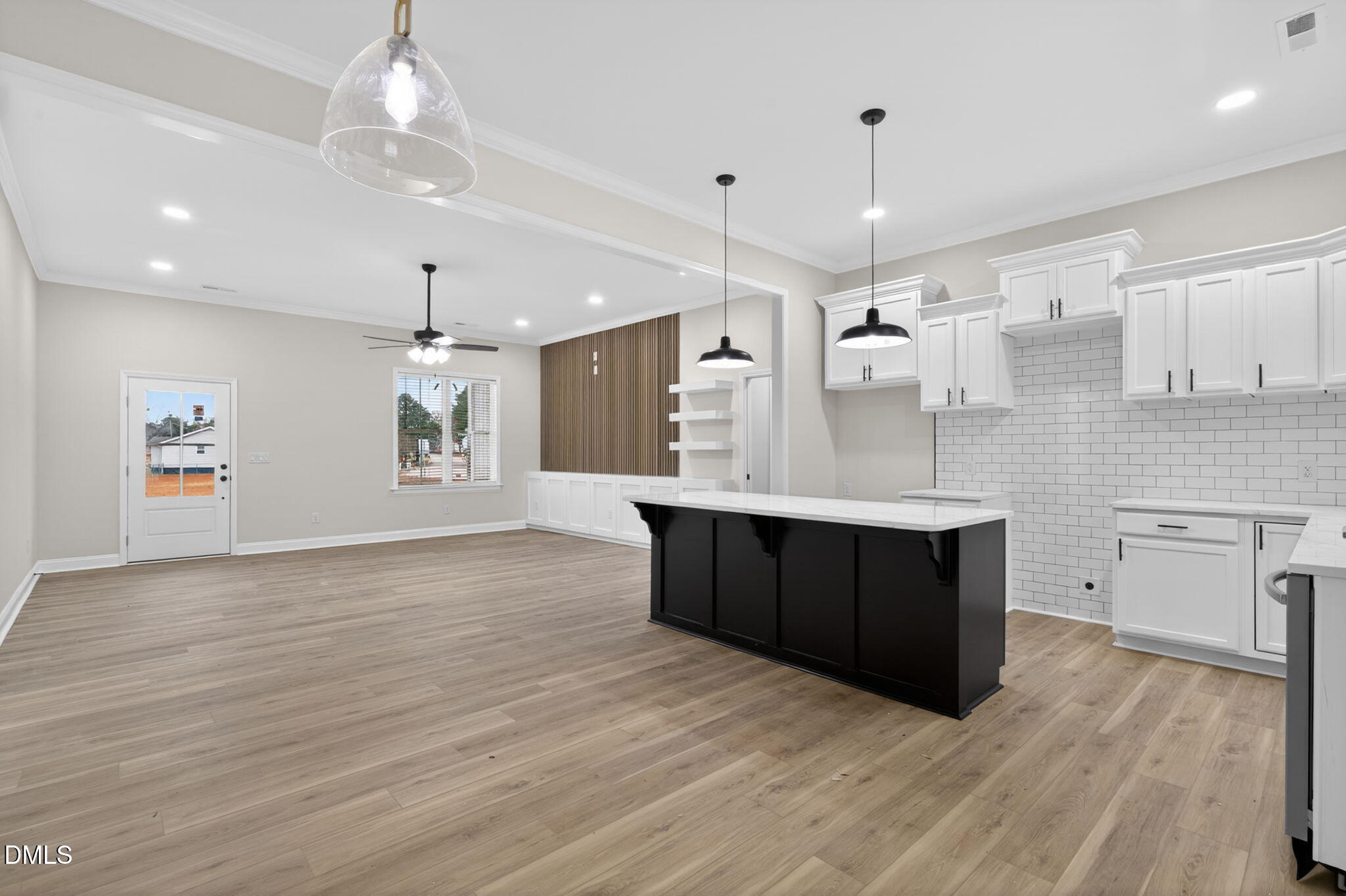 2126 Fieldcrest Road East Wilson, NC 27893 - Photo 13 of 40 a large kitchen with stainless steel appliances a large counter top a refrigerator and a sink