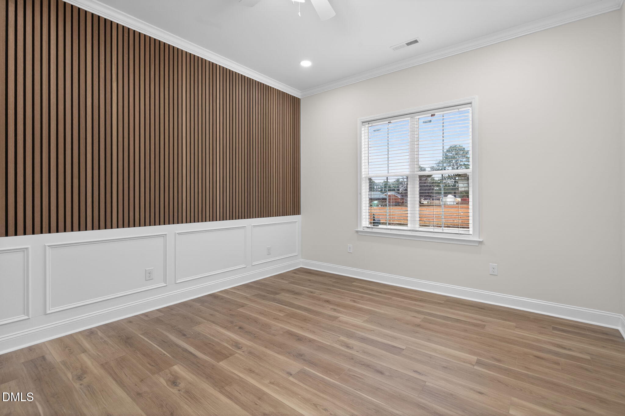 2126 Fieldcrest Road East Wilson, NC 27893 - Photo 19 of 40 a view of an empty room with wooden floor