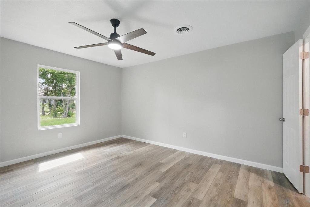 2781 Beech Street, Unit A & B Abilene, TX 79601 - Photo 15 of 35 wooden floor in an empty room with a window