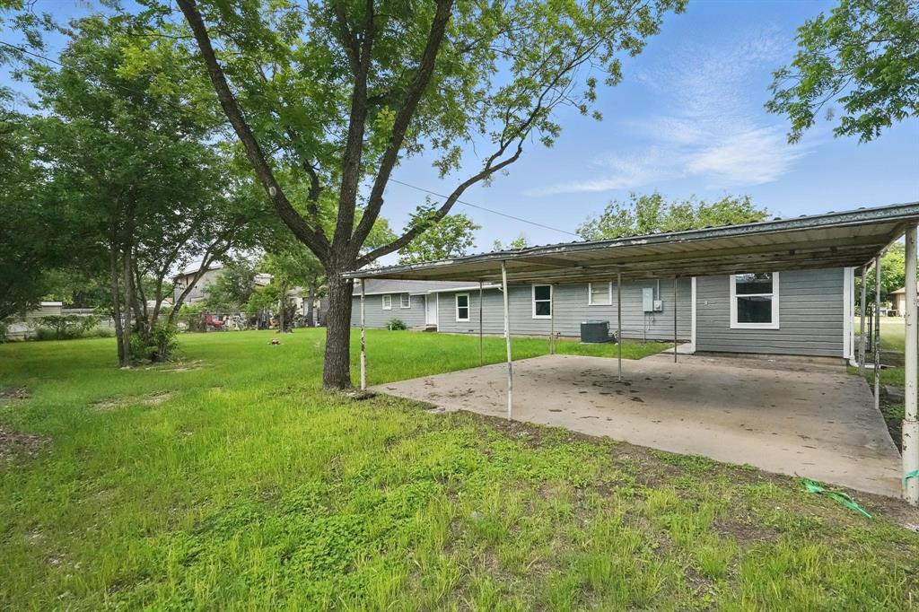 2781 Beech Street, Unit A & B Abilene, TX 79601 - Photo 31 of 35 a view of a house with a yard