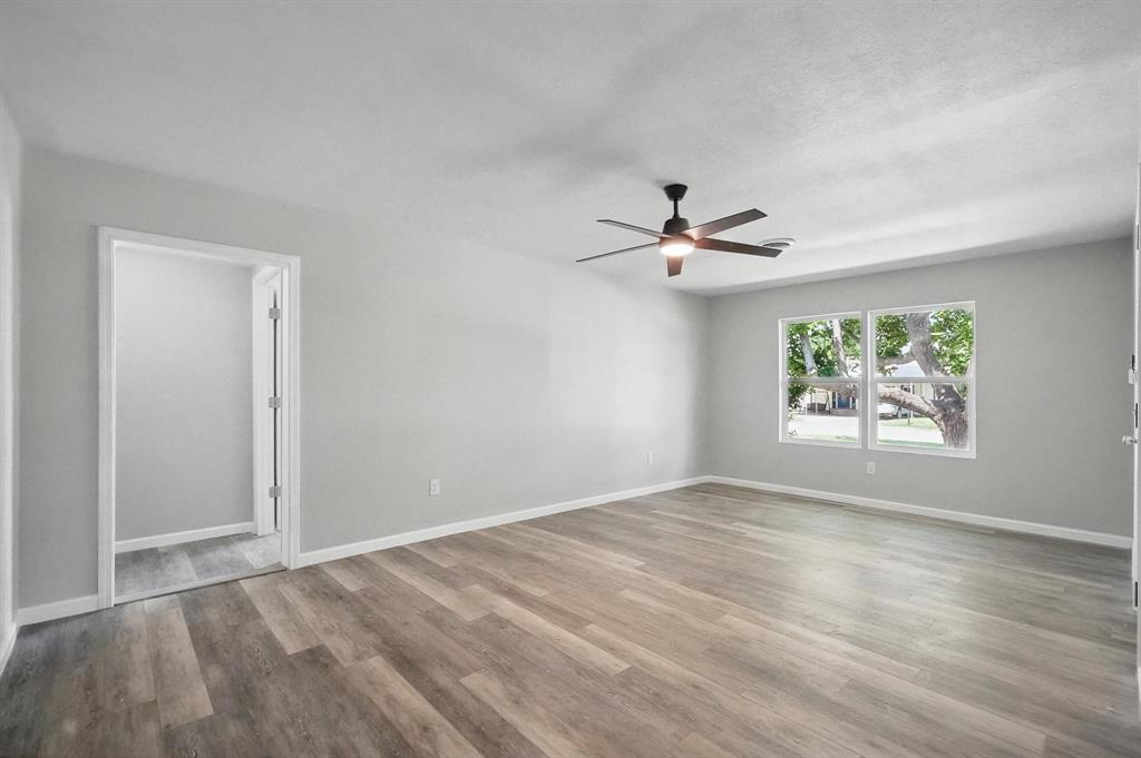 2781 Beech Street, Unit A & B Abilene, TX 79601 - Photo 6 of 35 wooden floor in an empty room with a window