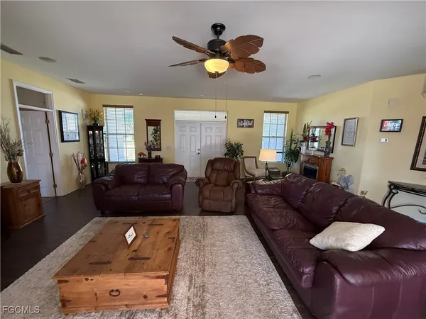 a living room with furniture and a rug