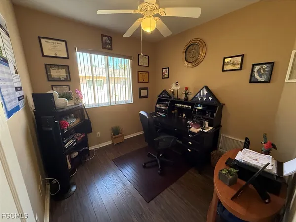 a room with furniture and wooden floor