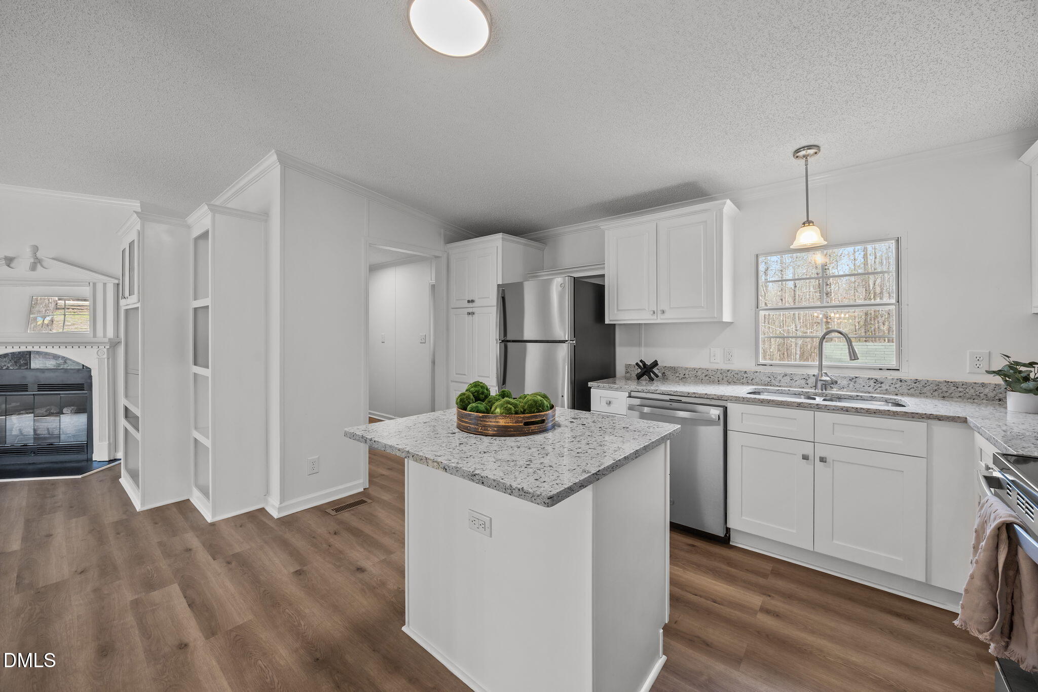 35 Athens Court Cameron, NC 28326 - Photo 11 of 44 a kitchen with stainless steel appliances granite countertop a sink stove and refrigerator