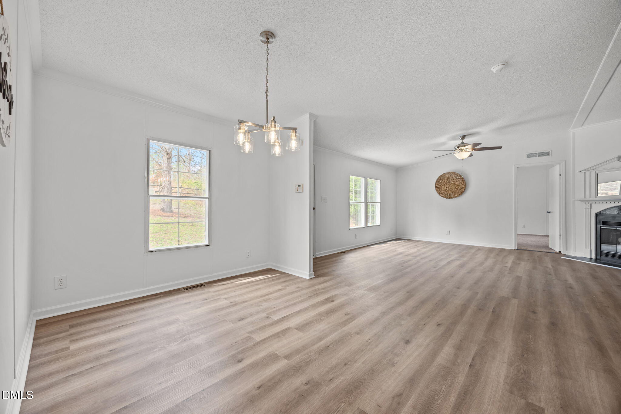 35 Athens Court Cameron, NC 28326 - Photo 19 of 44 a view of empty room with wooden floor and window