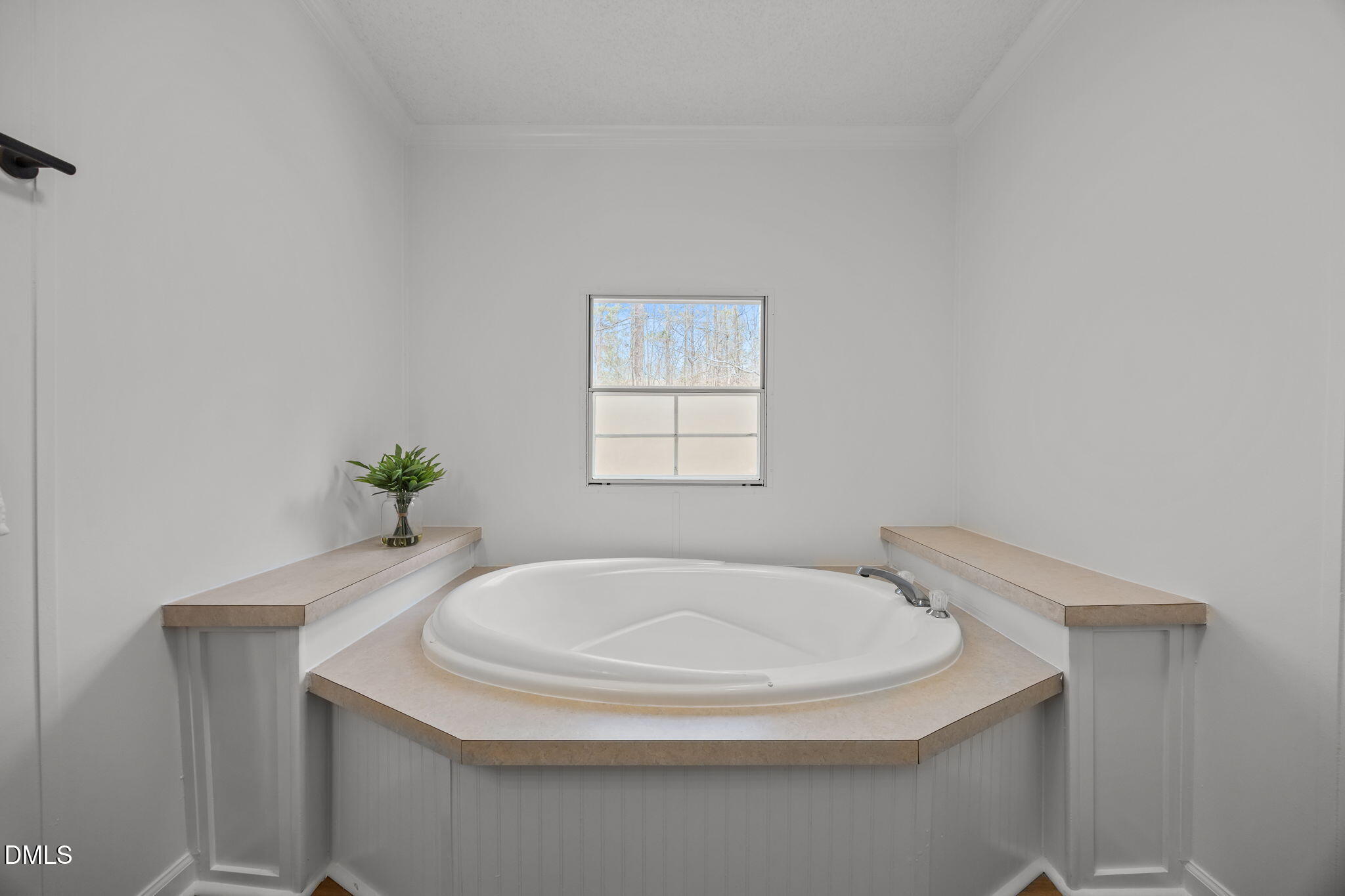35 Athens Court Cameron, NC 28326 - Photo 25 of 44 a bathroom with a sink and a window