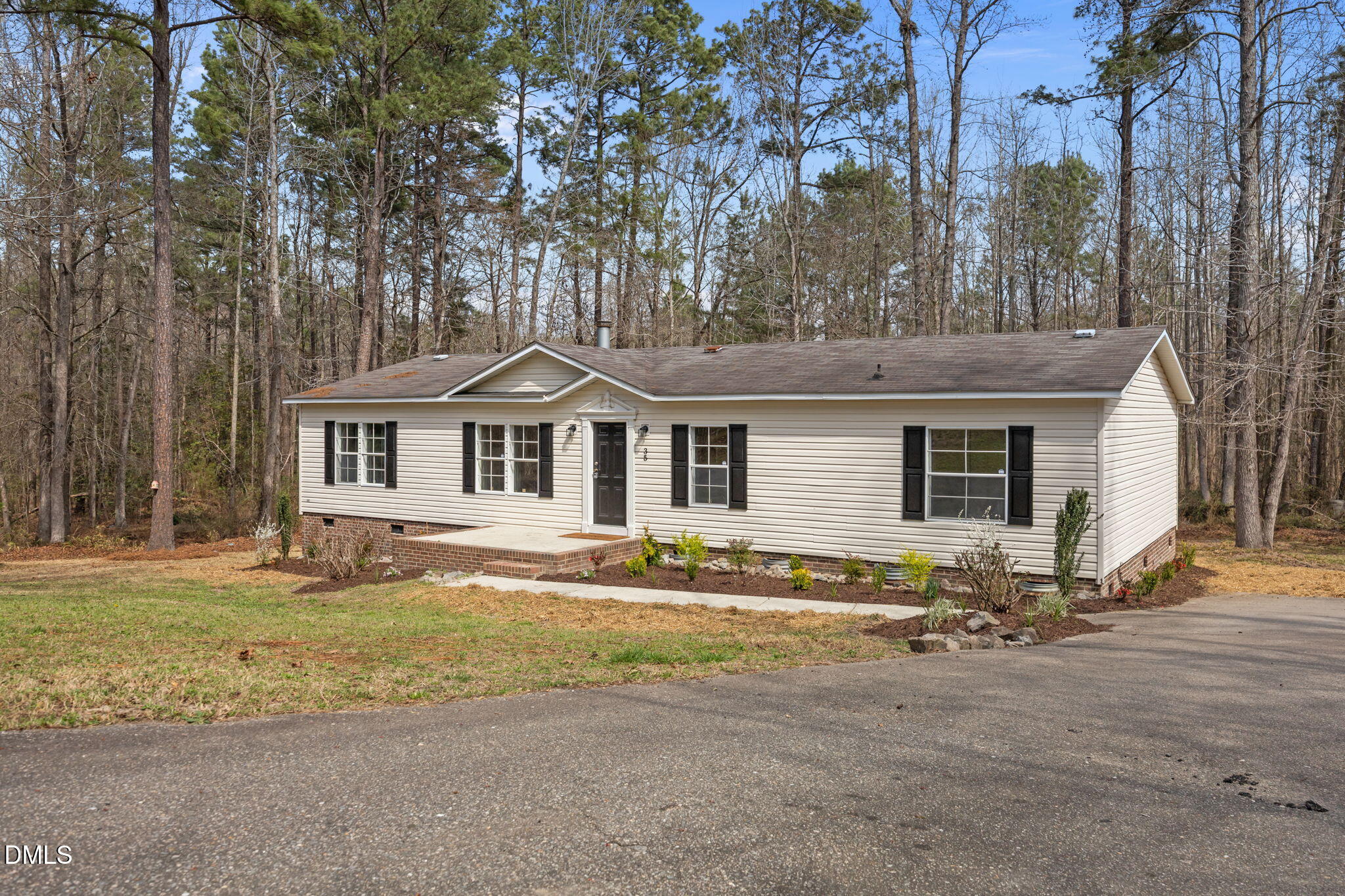 35 Athens Court Cameron, NC 28326 - Photo 40 of 44 a front view of house with yard