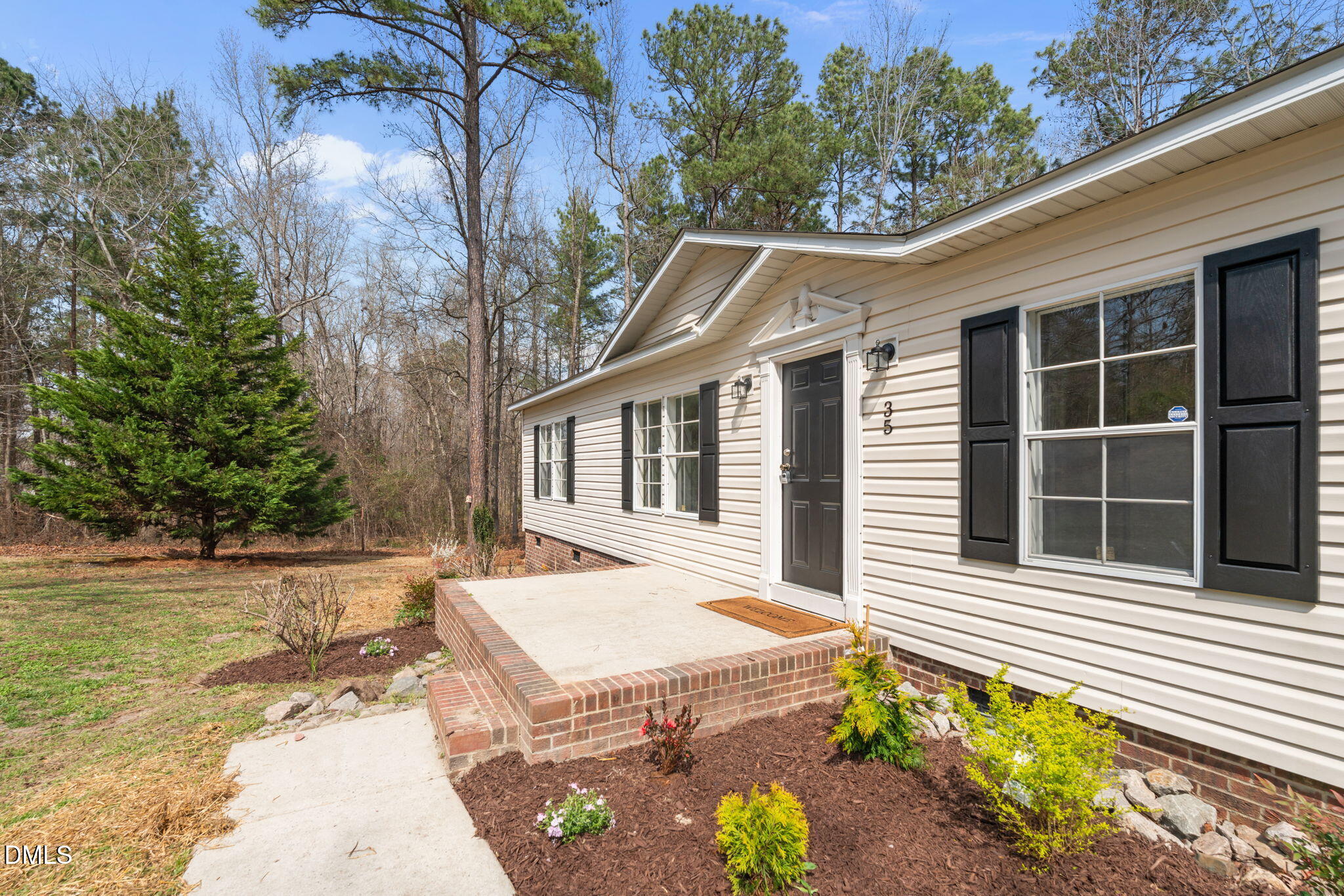 35 Athens Court Cameron, NC 28326 - Photo 5 of 44 a view of a house with a yard